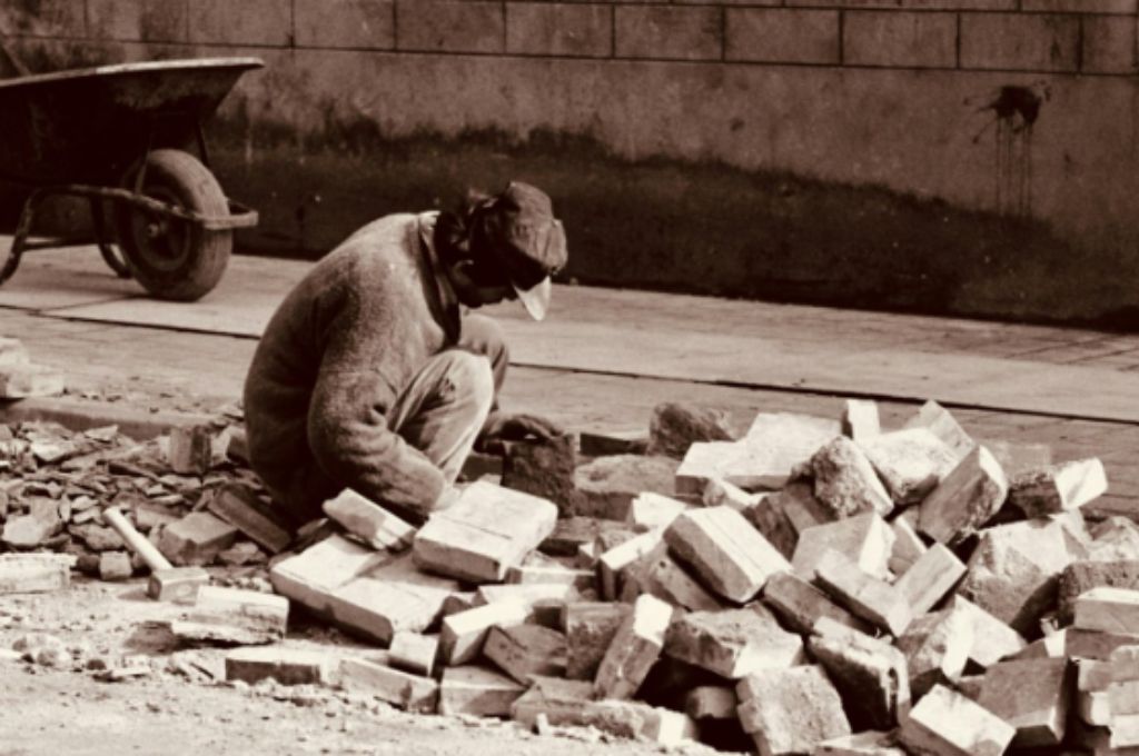 candid photo of person working in roadside