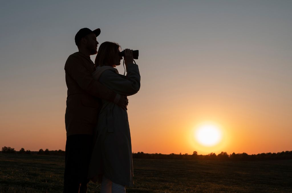 women holding a camera