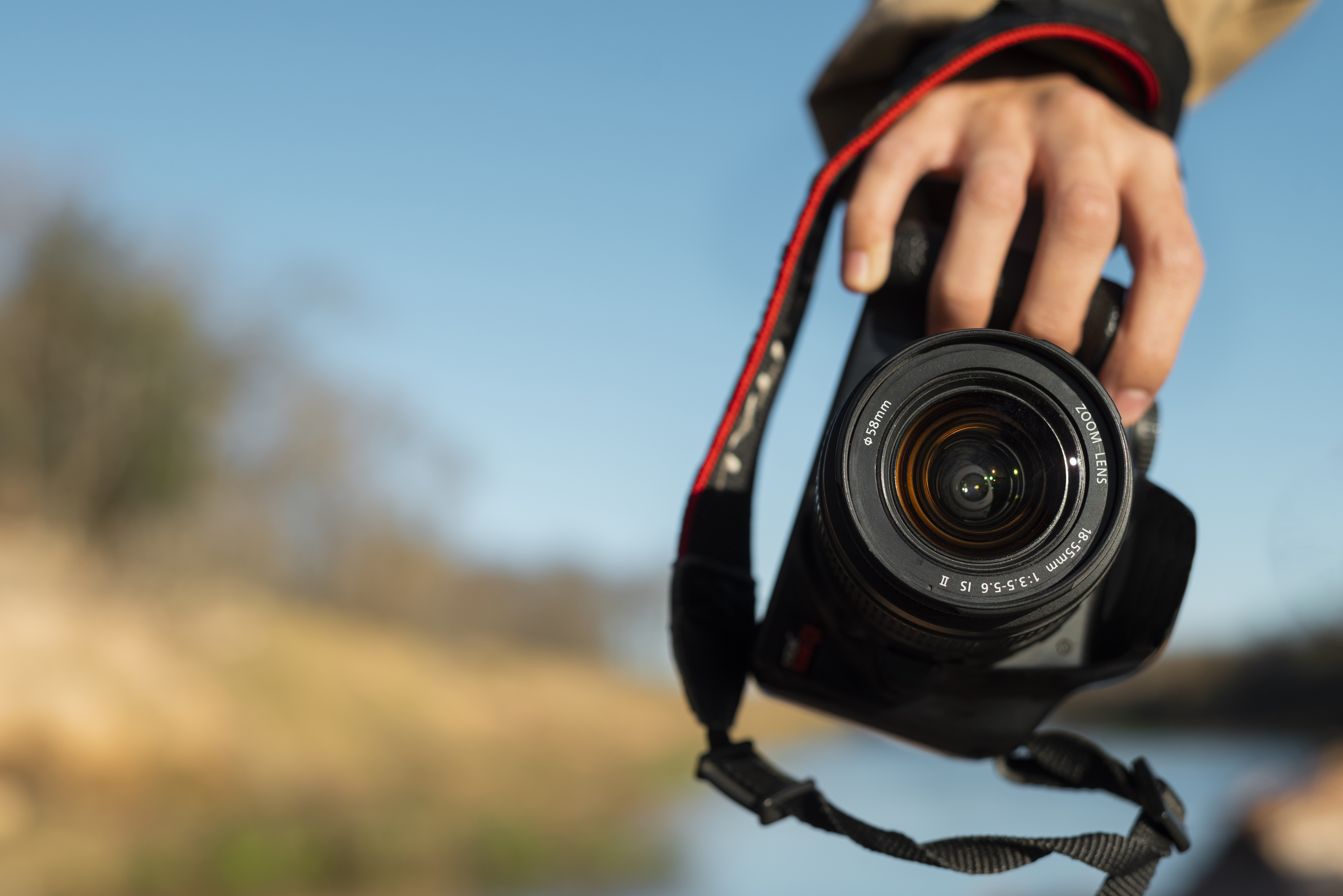 hand-holding-photo-camera