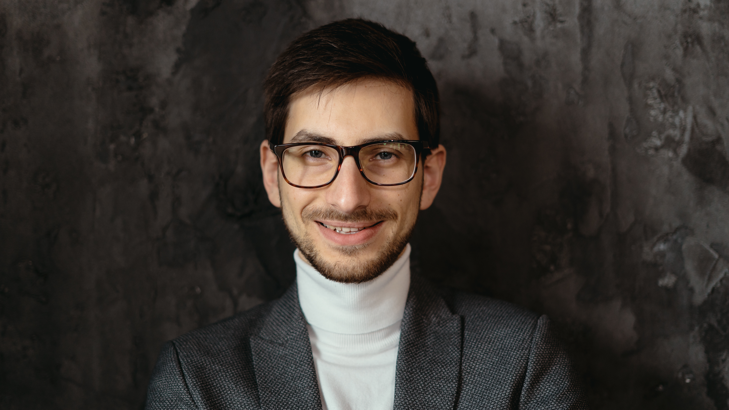 young confident businessman-wearing-glasses