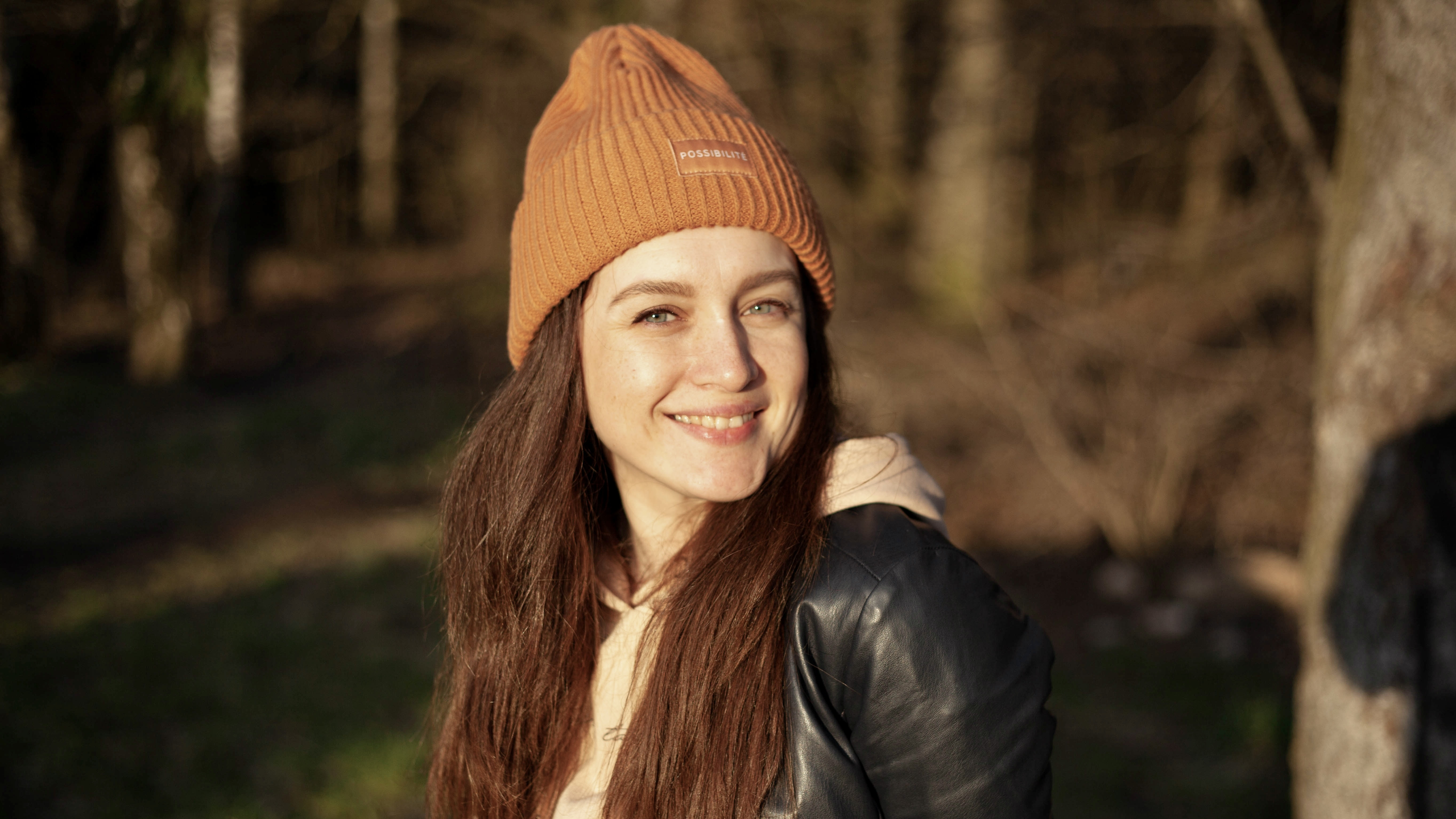 smiling woman portrait standing  outdoors